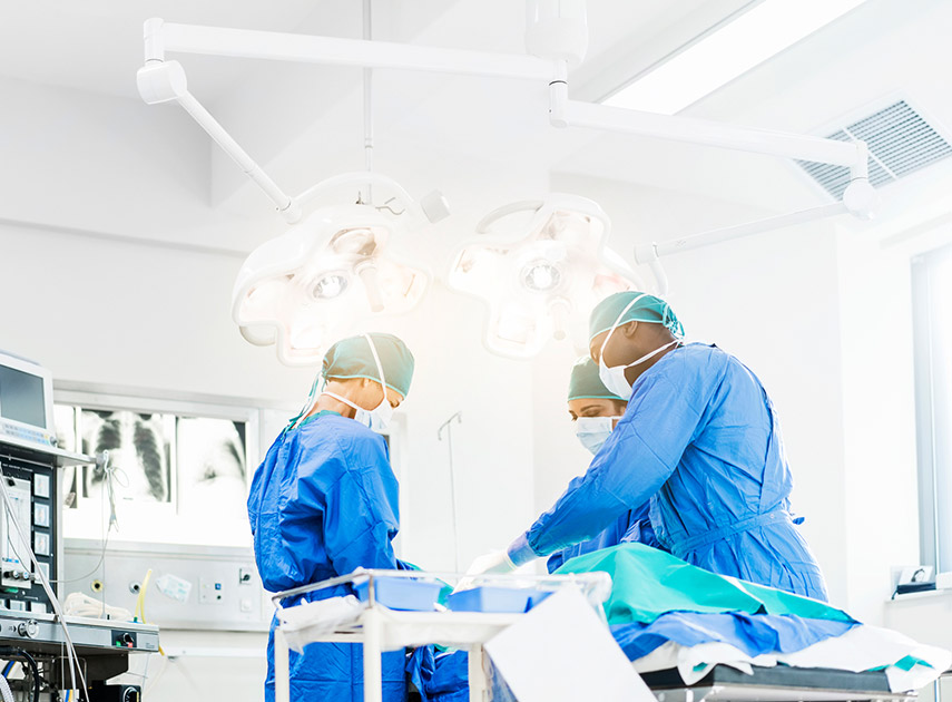 Surgeons-performing-lumbar-radiofrequency-neurotomy