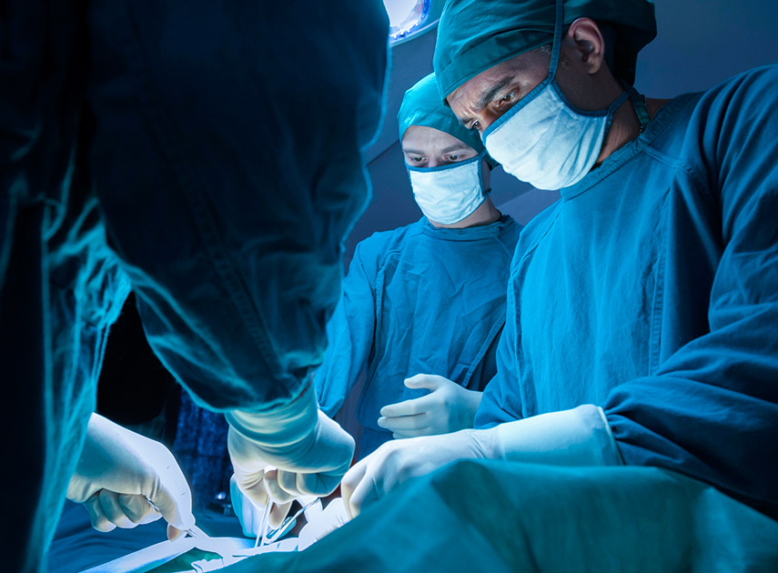Surgical-team-performing-bone-reconstruction-surgery