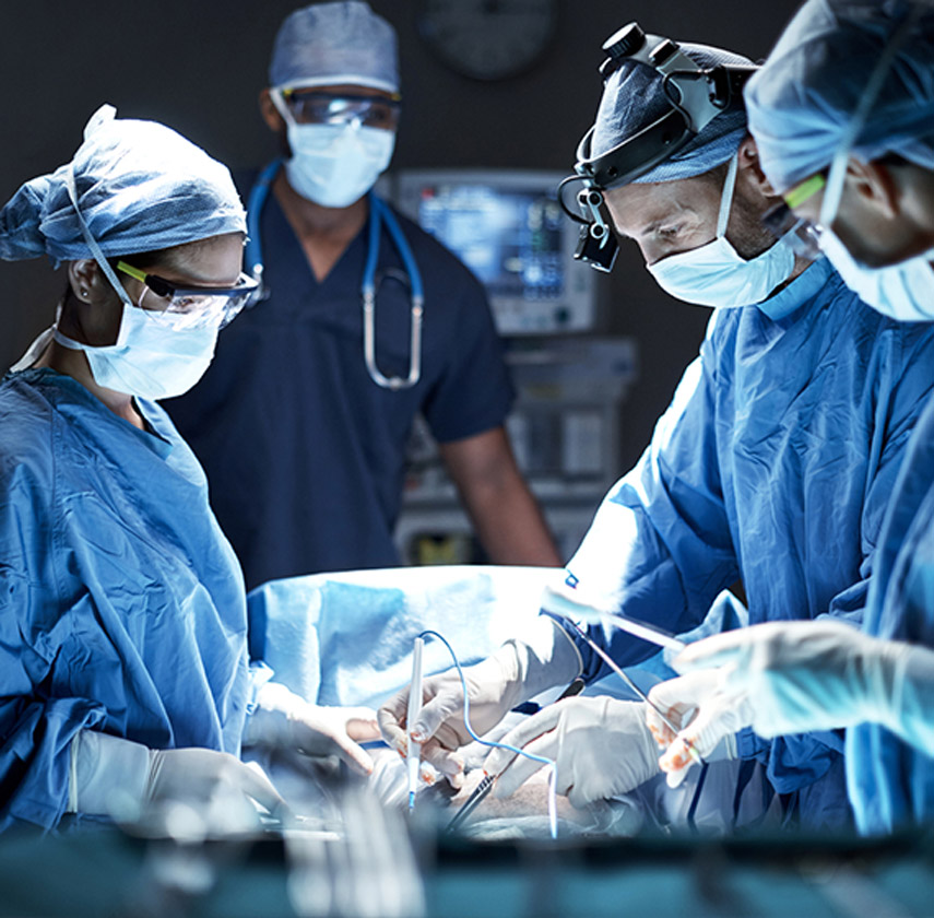 Team-of-surgeons-performing-breast-implant-illness-surgery